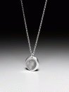 Silver chain with a small round double-sided fingerprint pendant